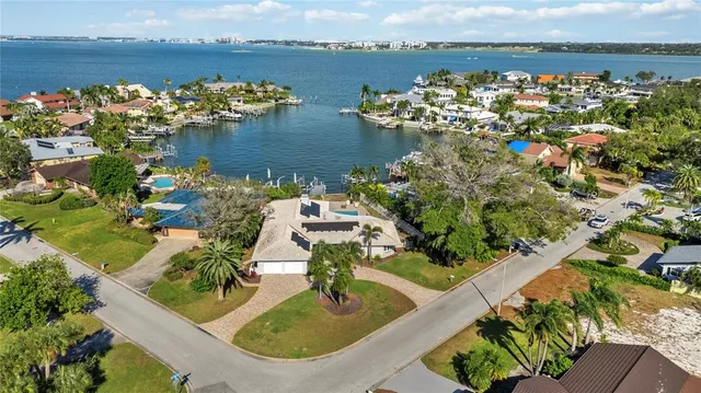 a living room with furniture wooden floor and window