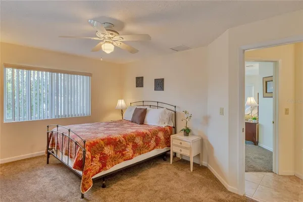 a view of a dining room with furniture wooden floor and chandelier