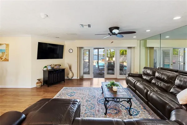 a view of a dining room with furniture and window