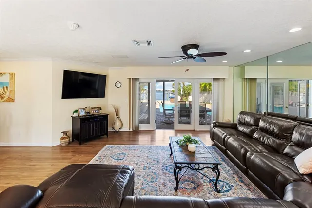 a view of a dining room with furniture and window