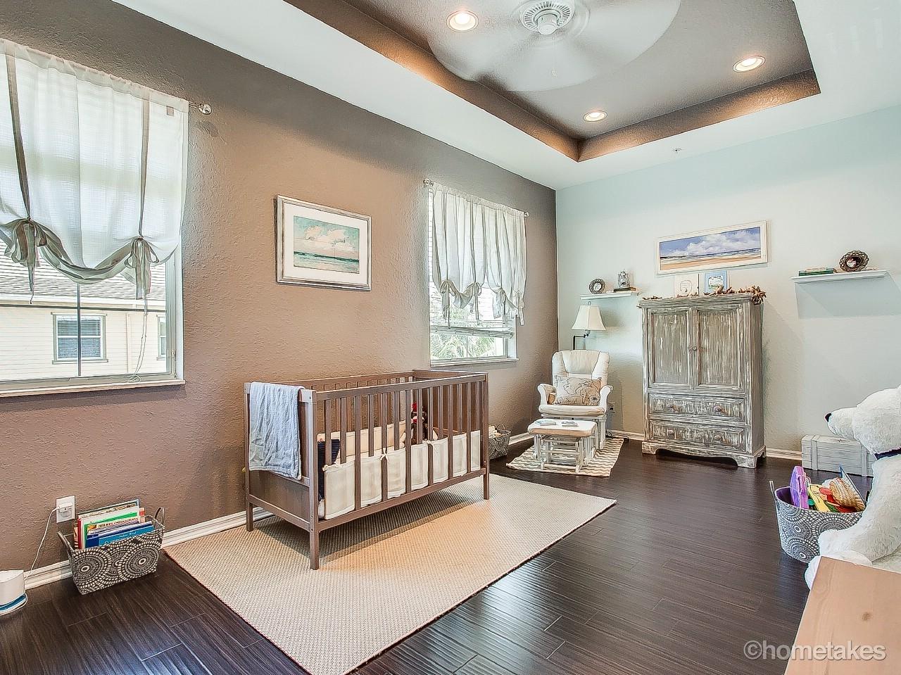 4308 Blowing Point Place Jupiter, FL 33458 - Photo 12 of 21 a bedroom with furniture and a window