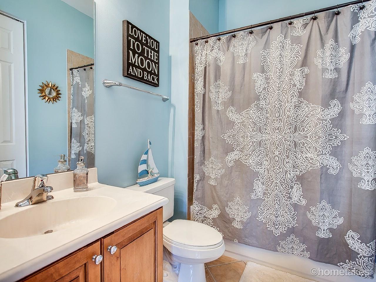 4308 Blowing Point Place Jupiter, FL 33458 - Photo 13 of 21 a bathroom with a sink and a toilet