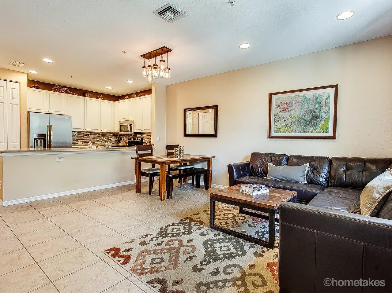 4308 Blowing Point Place Jupiter, FL 33458 - Photo 3 of 21 a living room with furniture and kitchen view