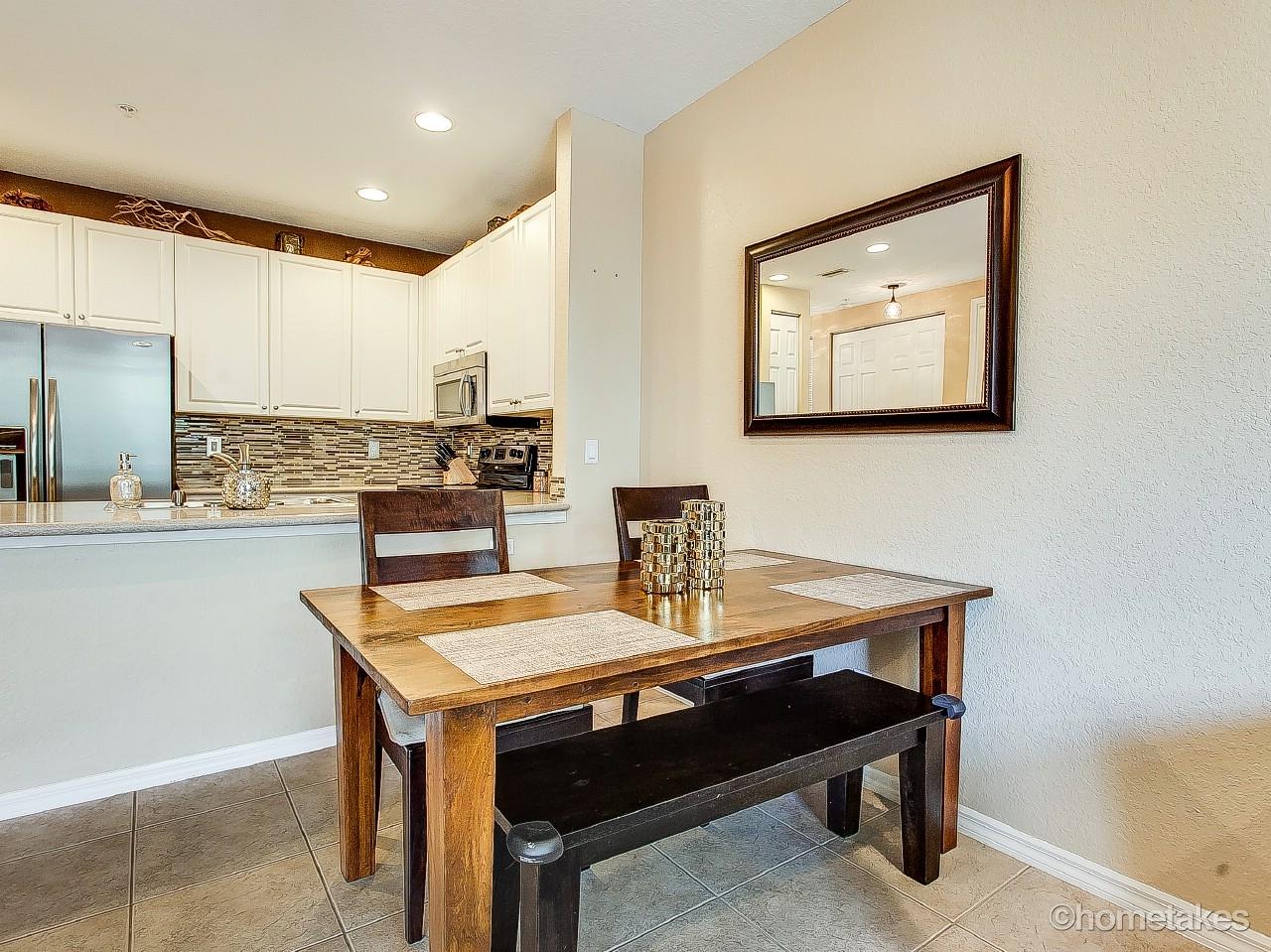 4308 Blowing Point Place Jupiter, FL 33458 - Photo 4 of 21 a view of a kitchen area with furniture and a kitchen
