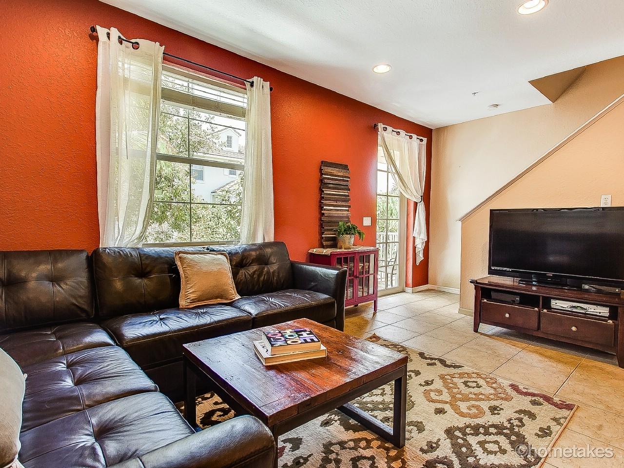 4308 Blowing Point Place Jupiter, FL 33458 - Photo 5 of 21 a living room with furniture and a flat screen tv