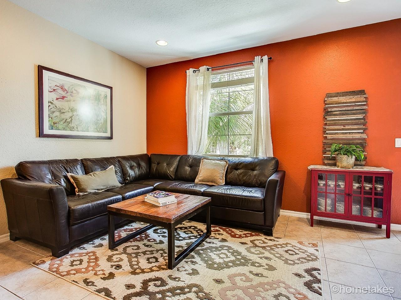 4308 Blowing Point Place Jupiter, FL 33458 - Photo 6 of 21 a living room with furniture and a large window