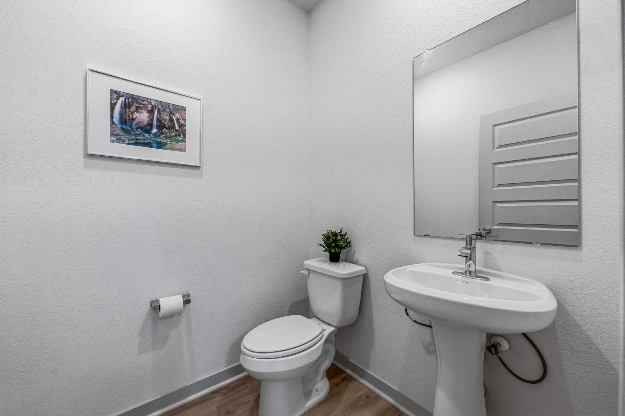 7511 Traylor Cove Austin, TX 78724 - Photo 26 of 40 a bathroom with a sink toilet and a mirror