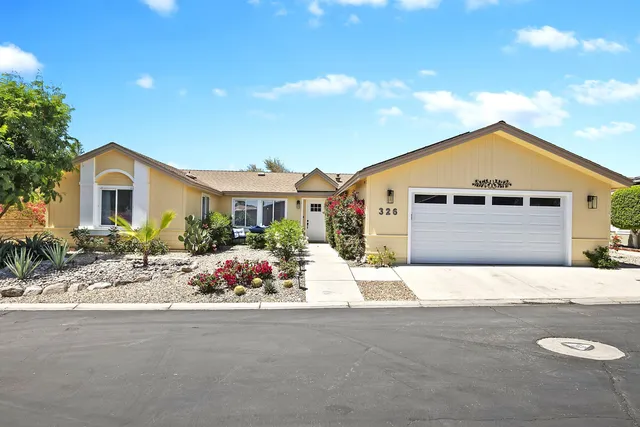 a front view of house with yard