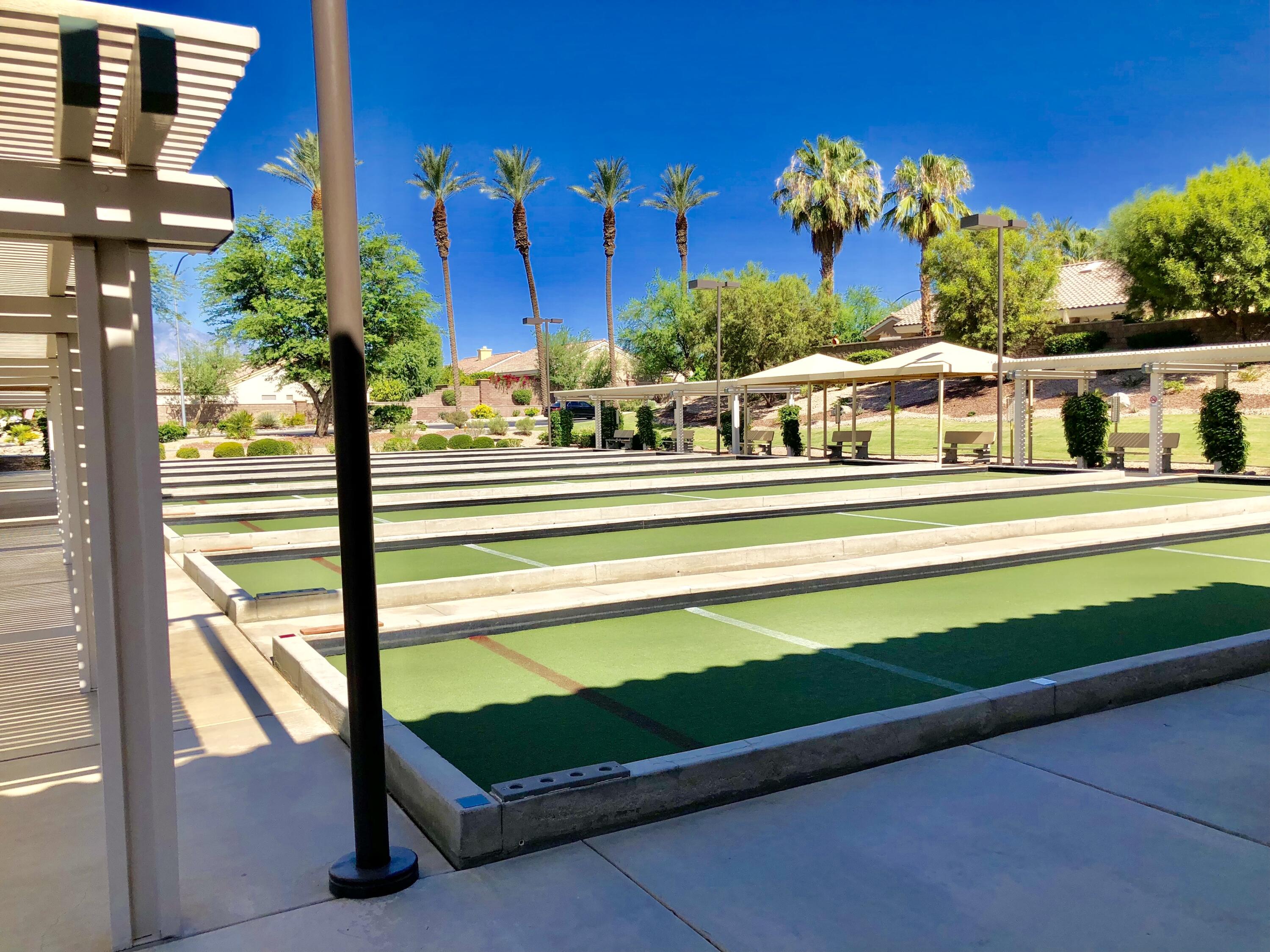 78376 Moongold Road Palm Desert, CA 92211 - Photo 30 of 36 a view of a building in the background