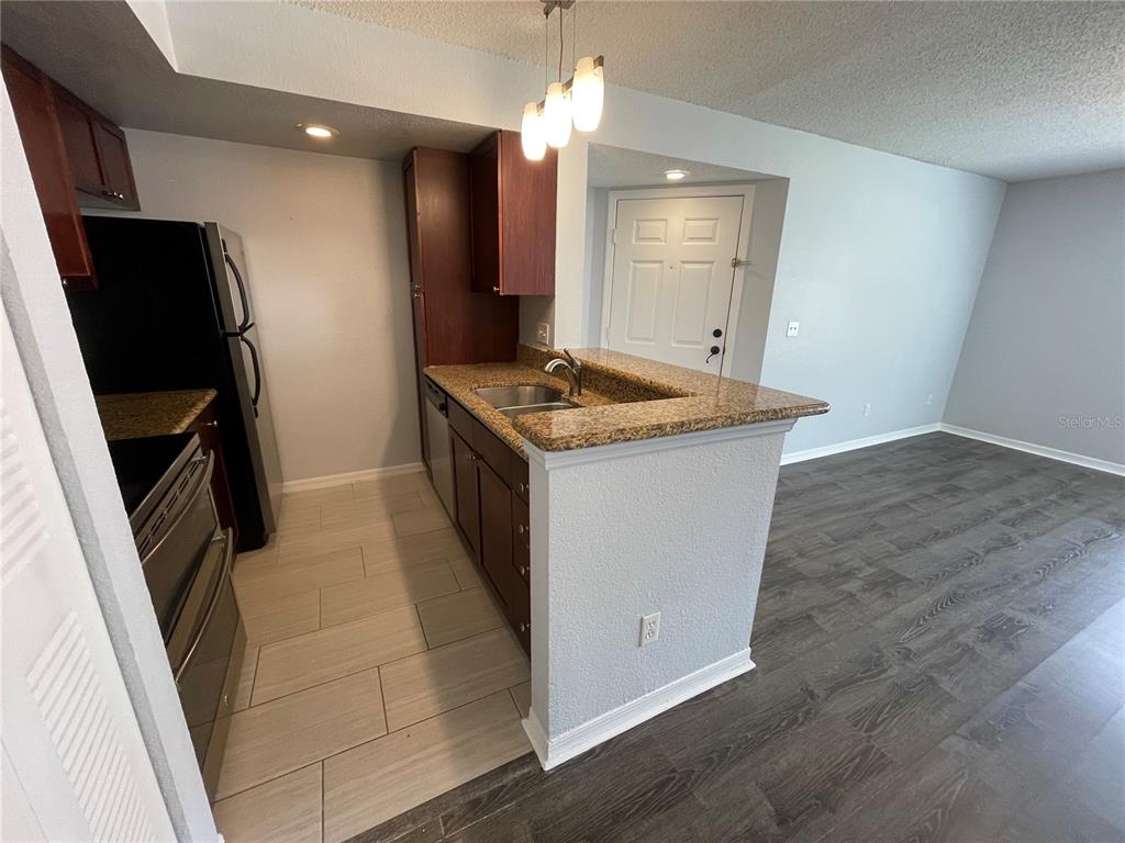 5128 Conroy Road, Unit 13 Orlando, FL 32811 - Photo 5 of 39 Gallery Image 5