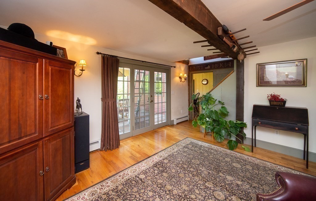 338 Neck Road Lancaster, MA 01523 - Photo 16 of 42 a view of livingroom with furniture and floor to ceiling window