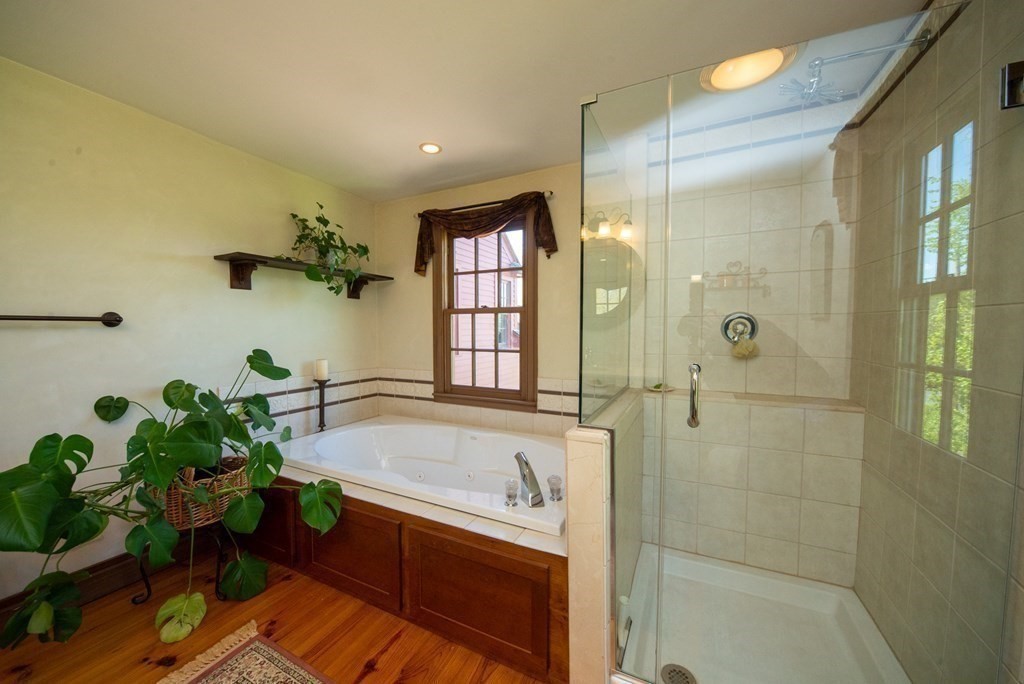 338 Neck Road Lancaster, MA 01523 - Photo 26 of 42 a bathroom with a tub sink and shower