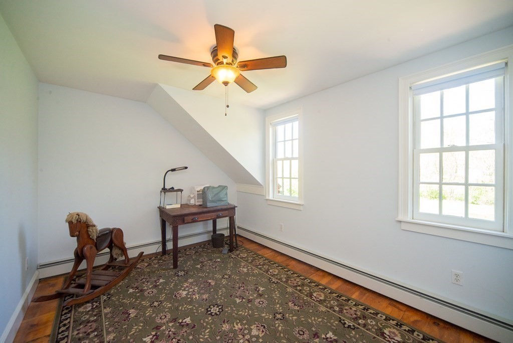 338 Neck Road Lancaster, MA 01523 - Photo 30 of 42 a living room with a window