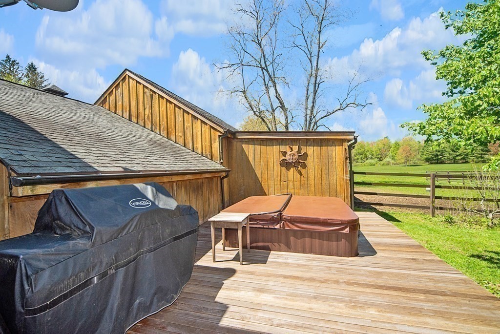 338 Neck Road Lancaster, MA 01523 - Photo 35 of 42 a view of backyard with seating space