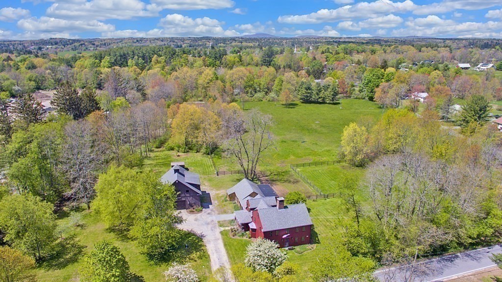 338 Neck Road Lancaster, MA 01523 - Photo 39 of 42 an aerial view of residential houses with outdoor space and trees