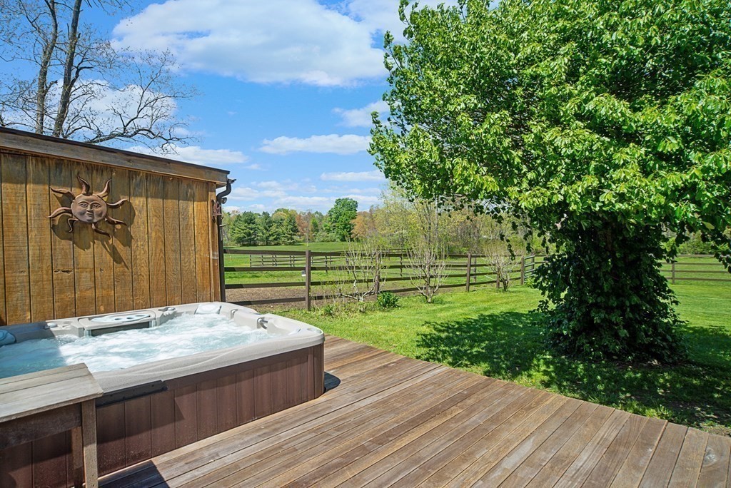 338 Neck Road Lancaster, MA 01523 - Photo 9 of 42 a view of backyard with wooden fence