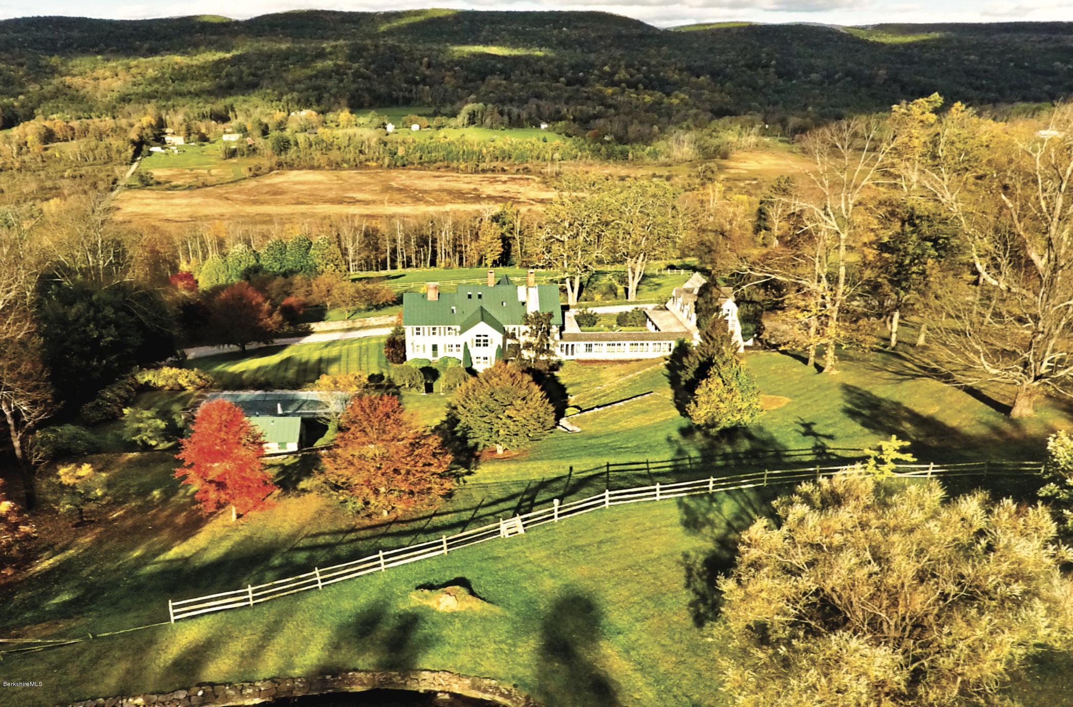 a view of residential houses with outdoor space
