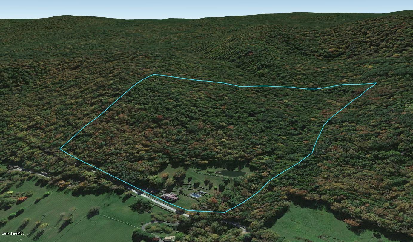 137 Jerusalem Road Tyringham, MA 01264 - Photo 11 of 59 a view of a field with a tree in the background