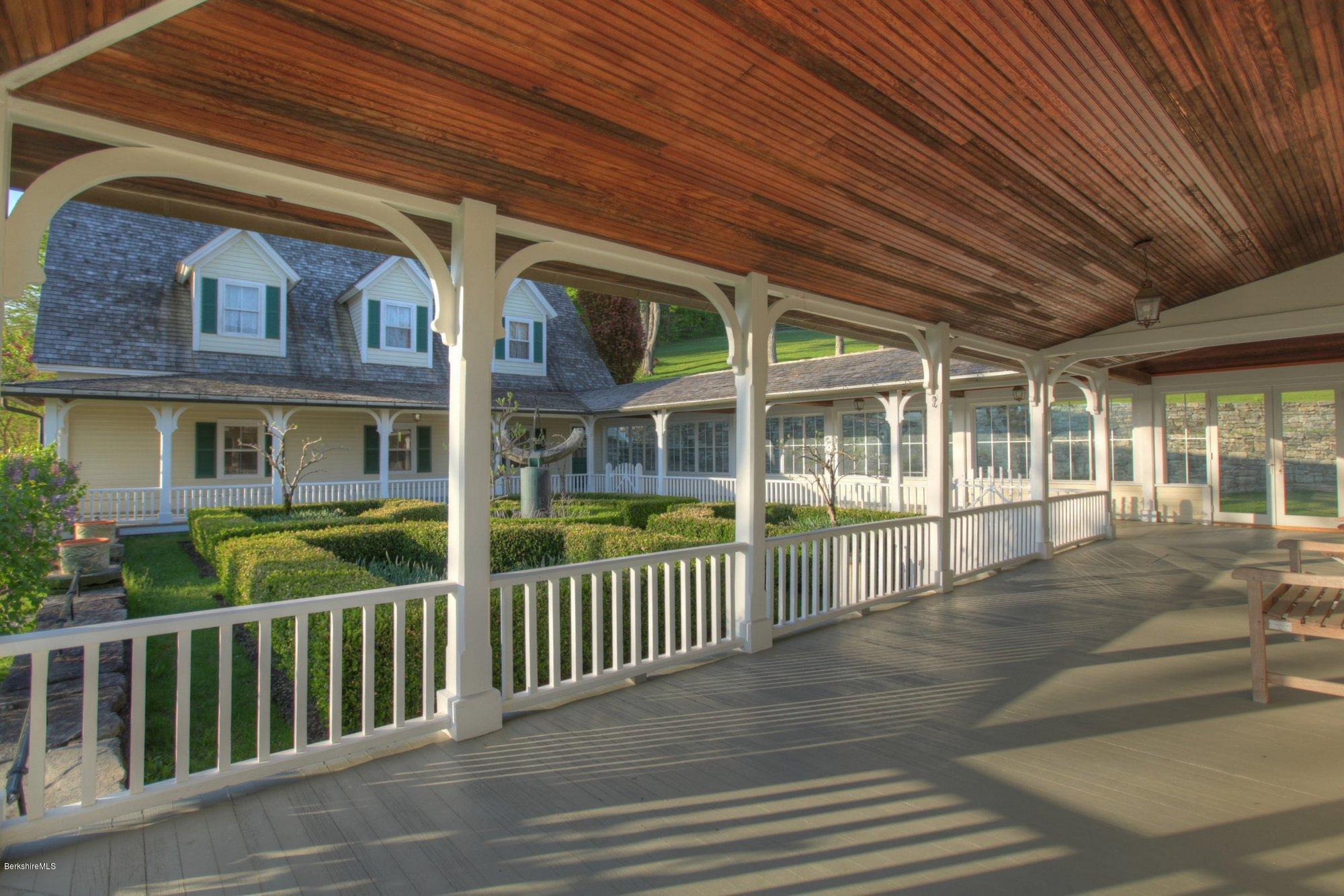 137 Jerusalem Road Tyringham, MA 01264 - Photo 13 of 59 a front view of a house with a garden