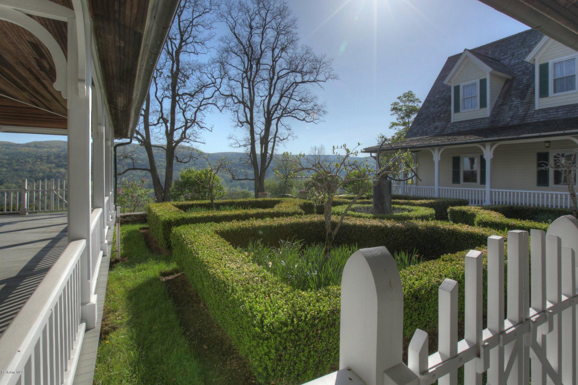 137 Jerusalem Road Tyringham, MA 01264 - Photo 14 of 59 a view of a house with a yard