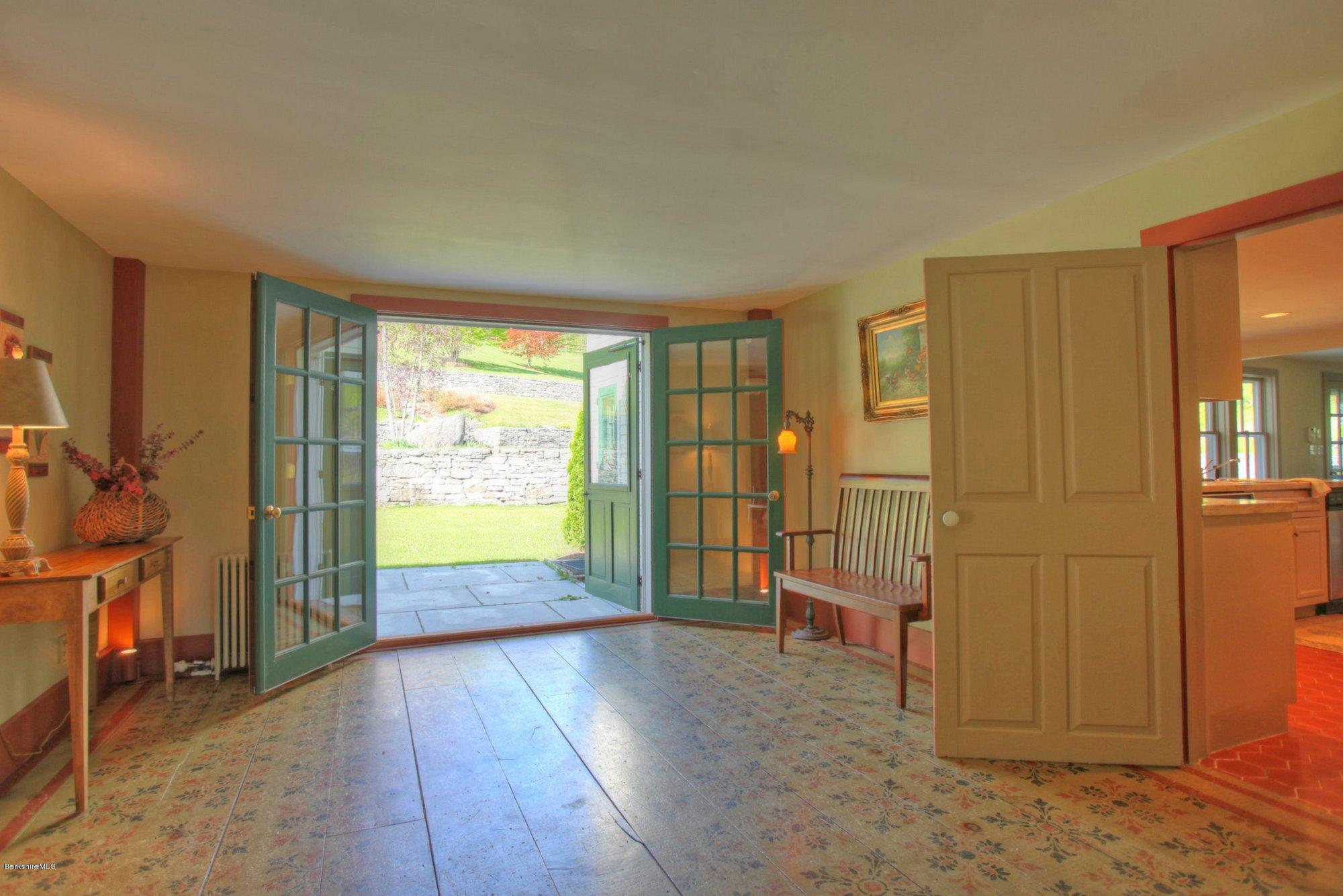 137 Jerusalem Road Tyringham, MA 01264 - Photo 18 of 59 wooden floor in an empty room with a window