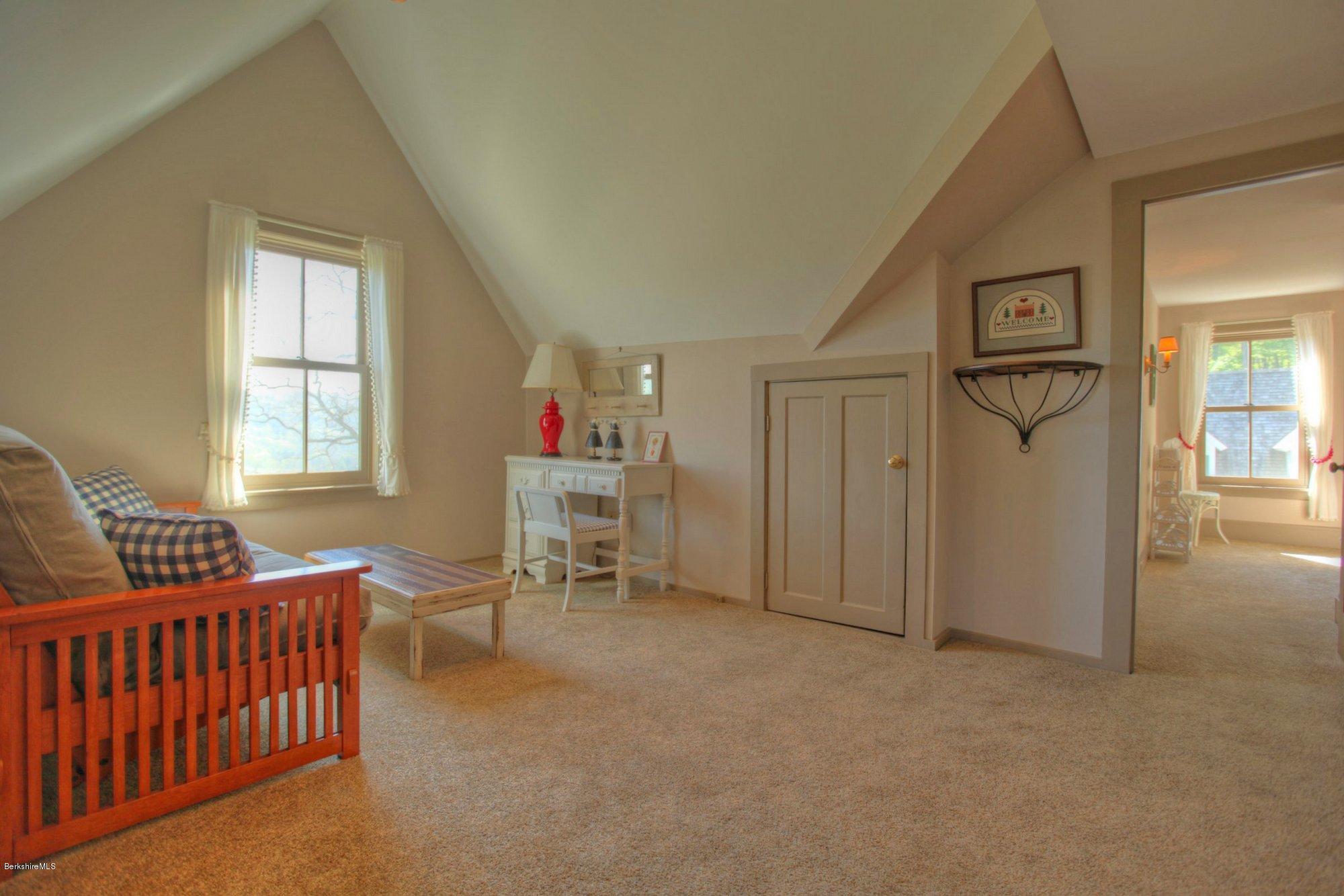 137 Jerusalem Road Tyringham, MA 01264 - Photo 39 of 59 a bedroom with furniture and a window