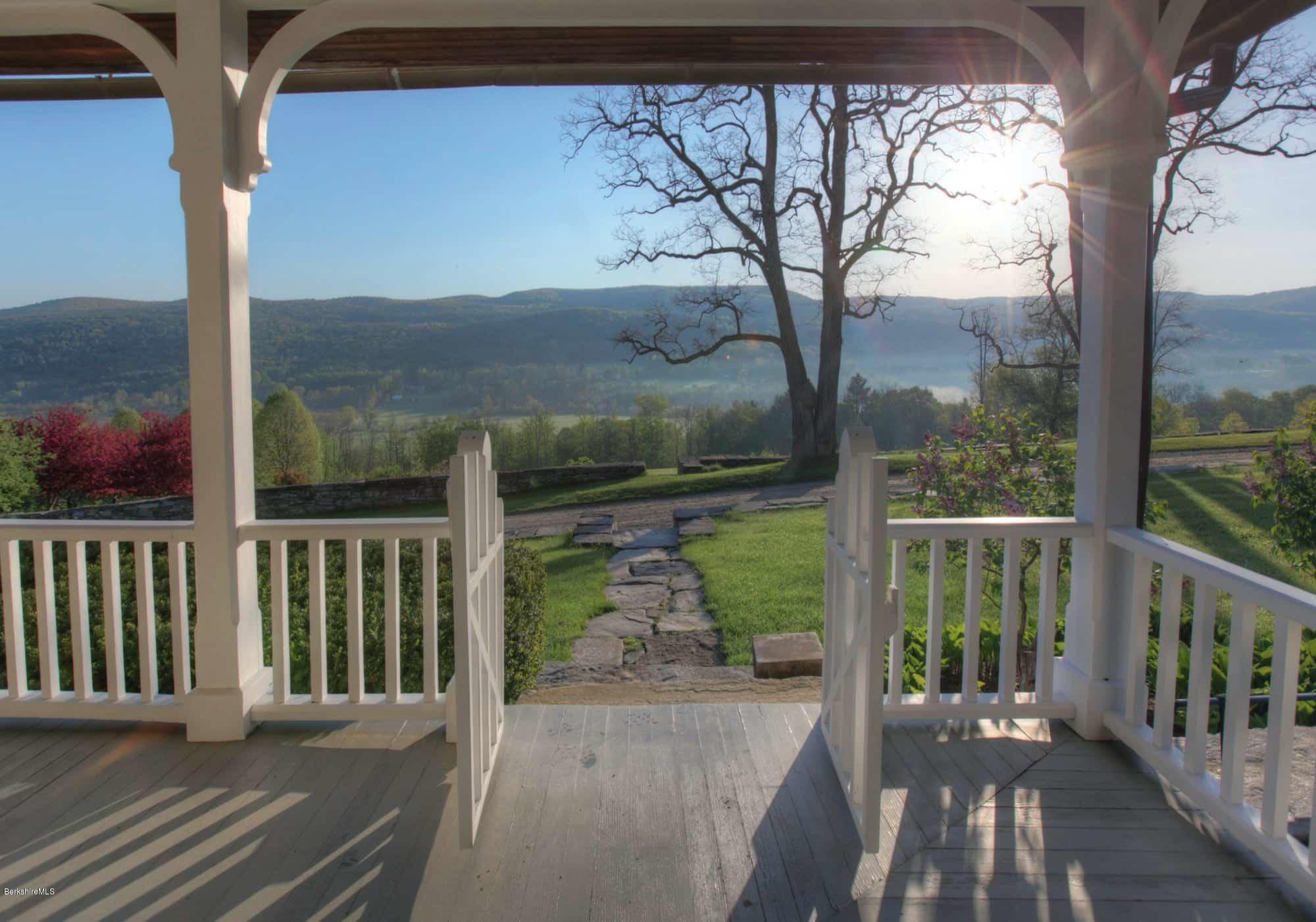 137 Jerusalem Road Tyringham, MA 01264 - Photo 6 of 59 a view of a two chair in the balcony