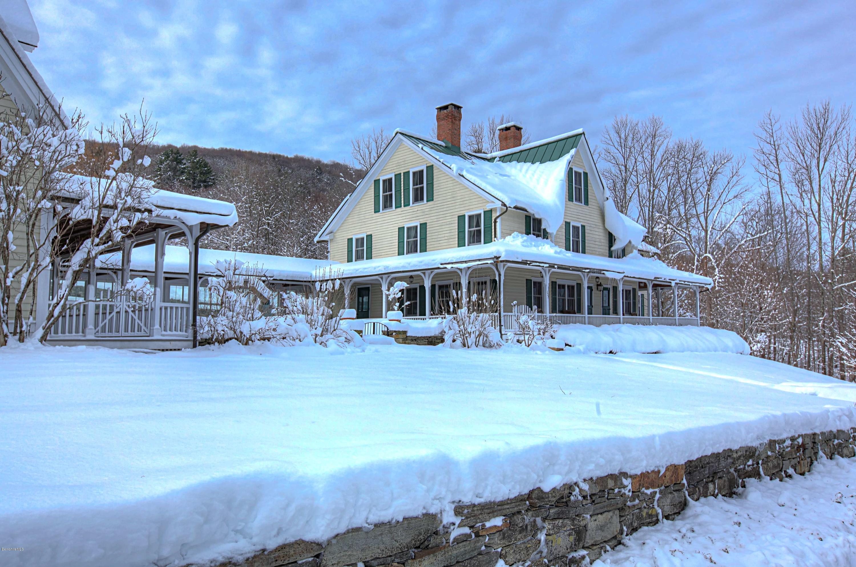 137 Jerusalem Road Tyringham, MA 01264 - Photo 51 of 59 a front view of a house with garden