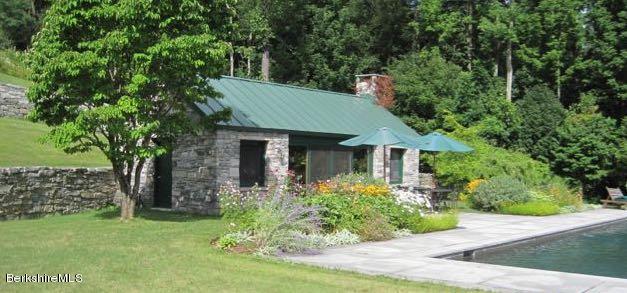 137 Jerusalem Road Tyringham, MA 01264 - Photo 56 of 59 a front view of a house with a yard