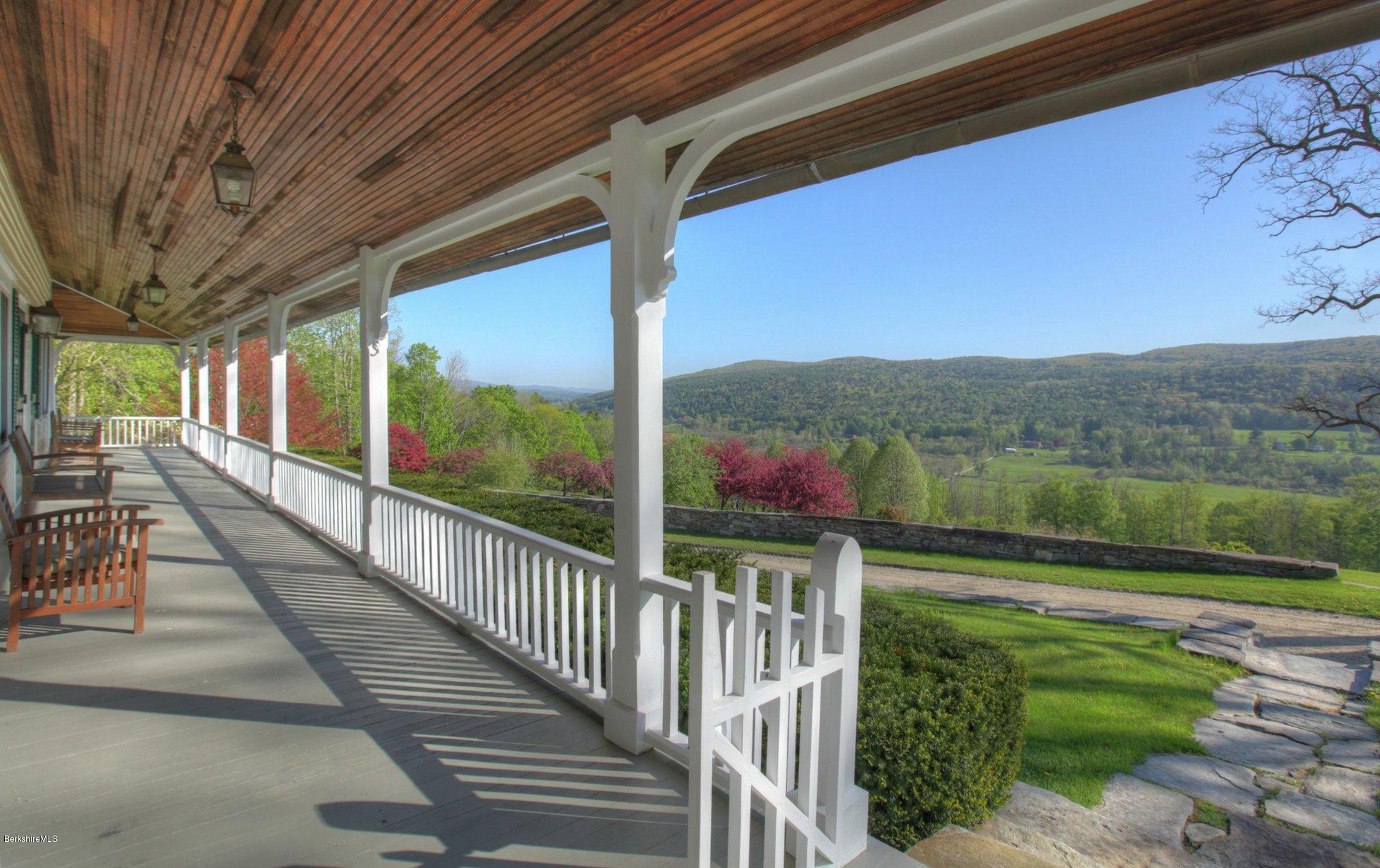 137 Jerusalem Road Tyringham, MA 01264 - Photo 9 of 59 a view of a two chair in the balcony