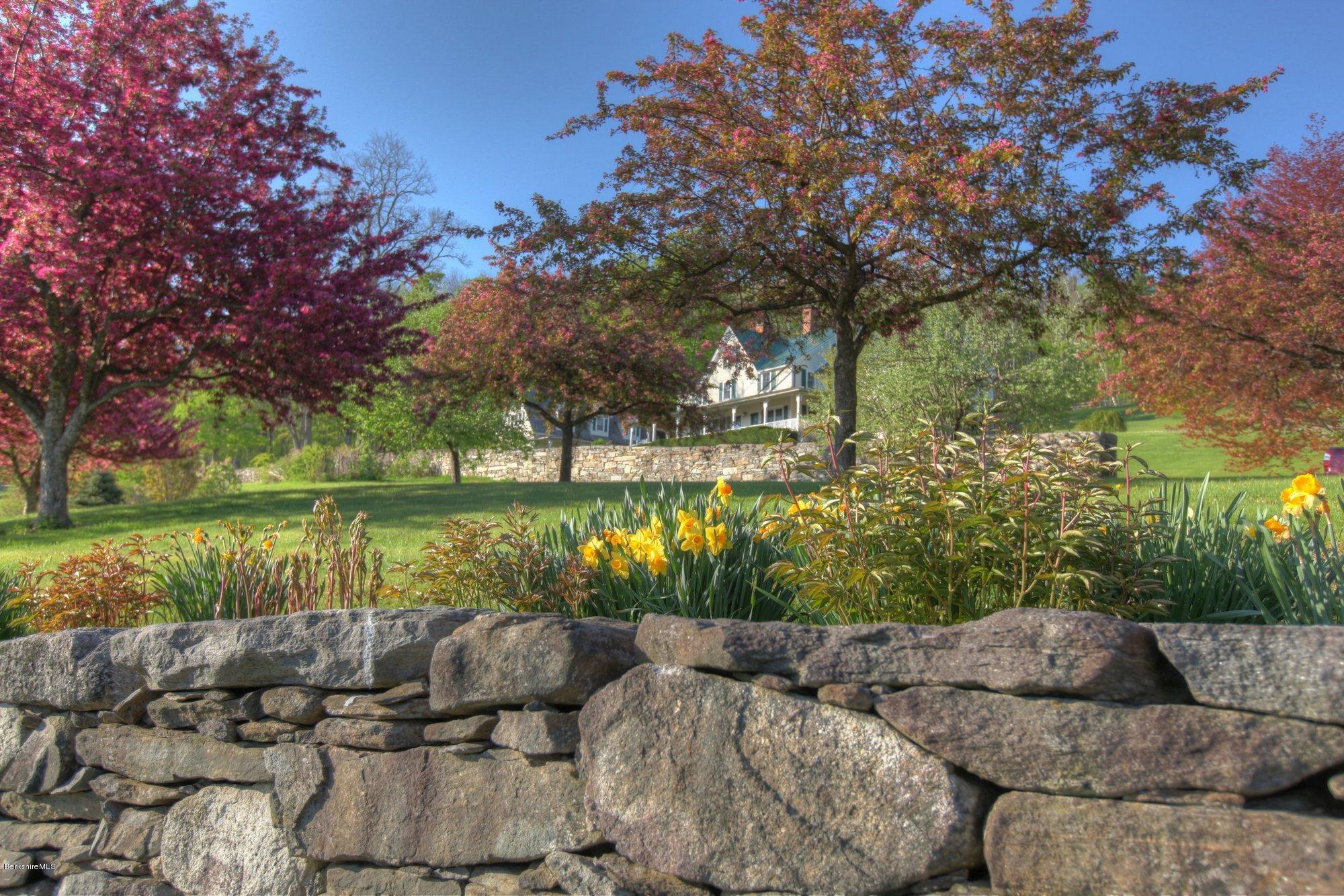 137 Jerusalem Road Tyringham, MA 01264 - Photo 10 of 59 a view of a couches in a patio next to a yard