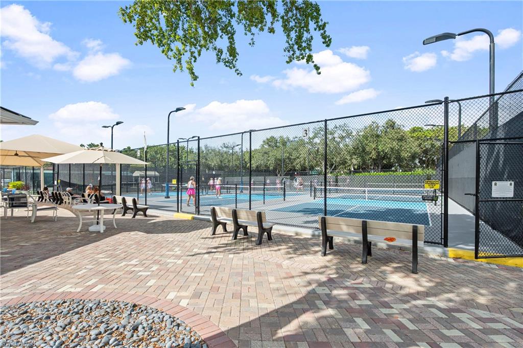 1742 Marsh Run Naples, FL 34109 - Photo 31 of 31 a view of a swimming pool with a patio