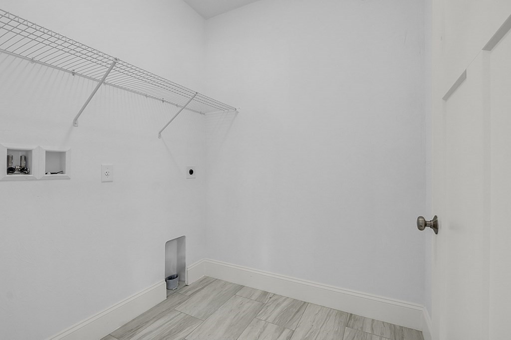 5 Boot Shop Road, Unit 31 Upton, MA 01568 - Photo 21 of 28 a view of a room with racks on the wall