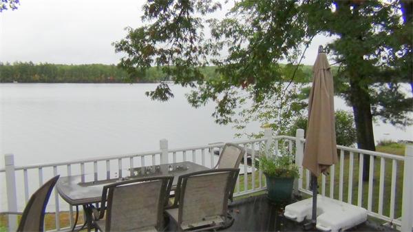 65 Spring Street Lunenburg, MA 01462 - Photo 2 of 7 a view of a chairs and table on the deck