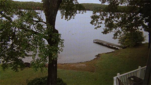 65 Spring Street Lunenburg, MA 01462 - Photo 4 of 7 a view of a lake from a balcony