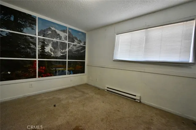 a view of a room with rack on the wall