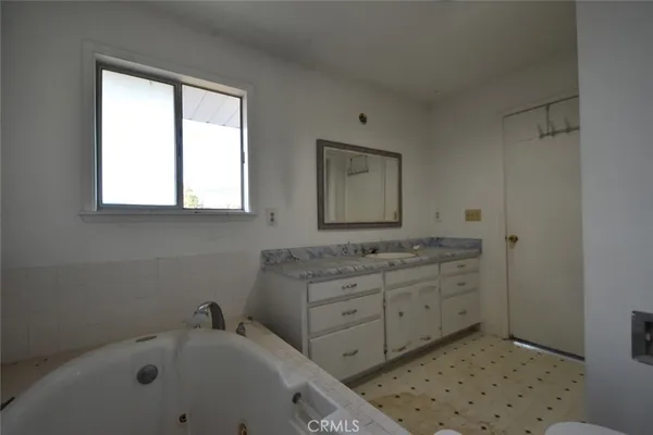 a bathroom with a sink and a bathtub