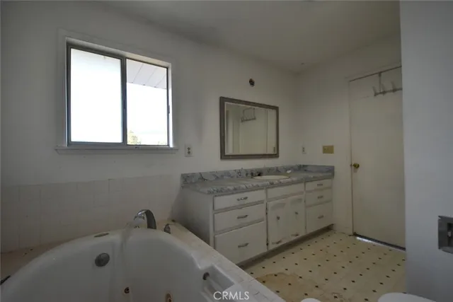 a bathroom with a sink and a bathtub