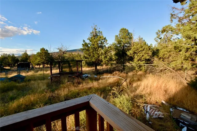a view of a lake from a balcony