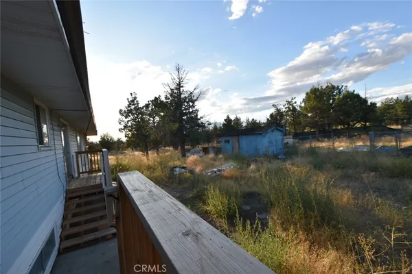 a view of a lake from a balcony
