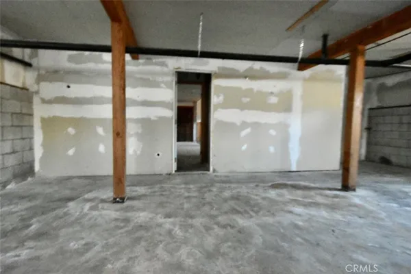 a view of brick house with large windows