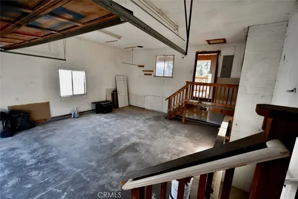 a view of livingroom with furniture and windows