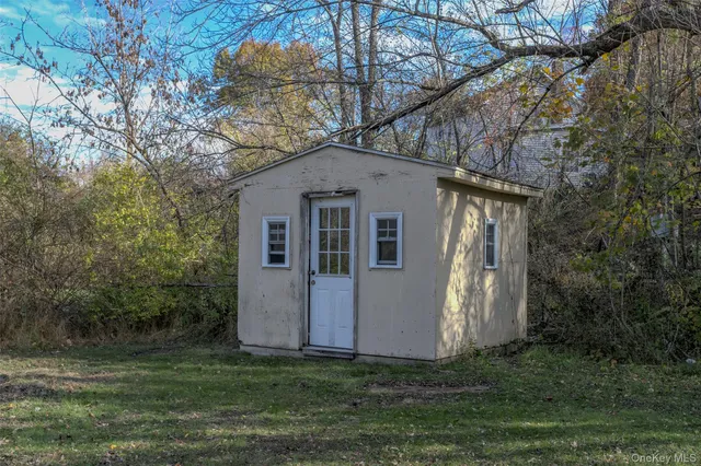 a view of backyard of house