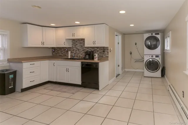 a kitchen with a cabinets and a stove top oven