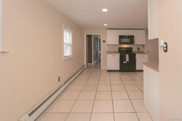 a view of kitchen with windows