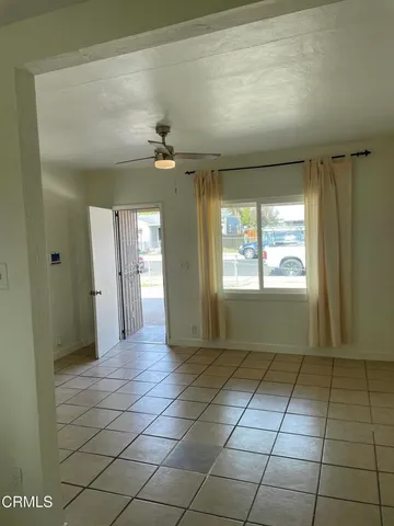 a view of a hallway with a window