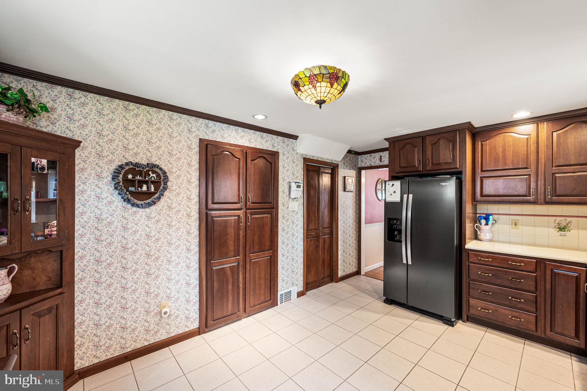 481 Maplewood Road Springfield, PA 19064 - Photo 11 of 31 a kitchen with stainless steel appliances granite countertop a refrigerator and a stove