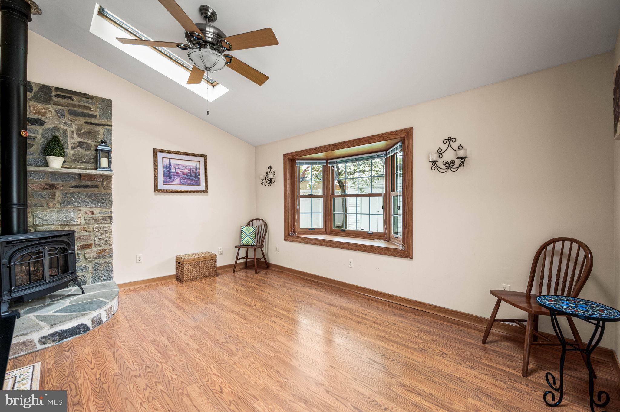 481 Maplewood Road Springfield, PA 19064 - Photo 13 of 31 a view of a livingroom with furniture and a ceiling fan