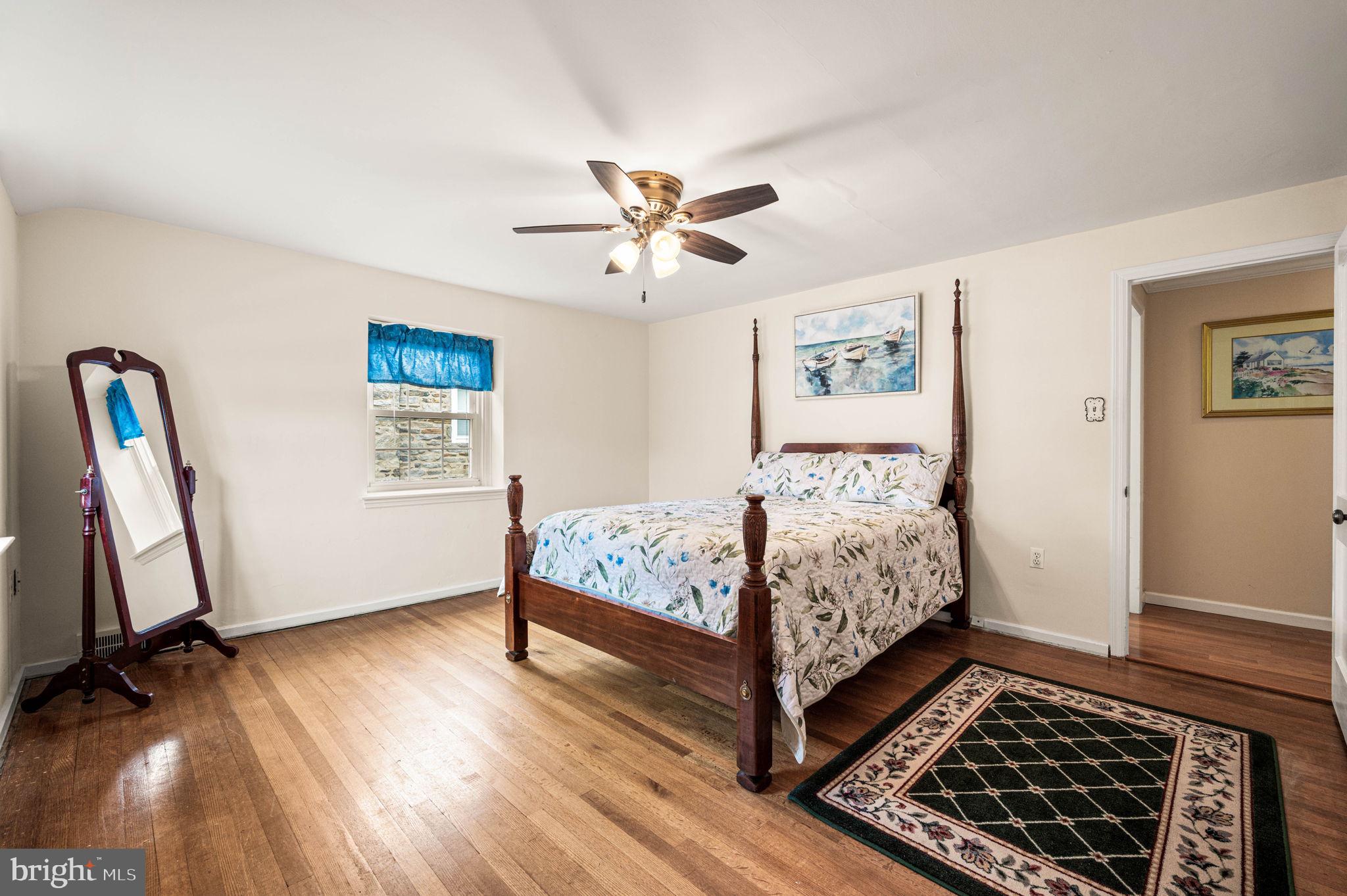 481 Maplewood Road Springfield, PA 19064 - Photo 16 of 31 a bedroom with a bed and a window