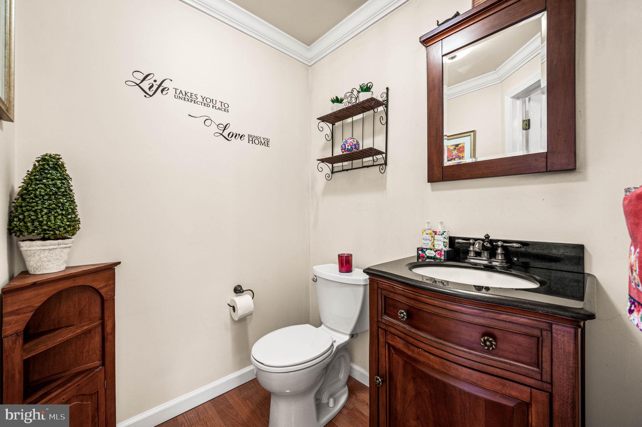 481 Maplewood Road Springfield, PA 19064 - Photo 22 of 31 a bathroom with a sink and a mirror